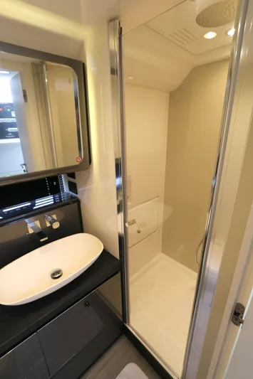 Momentum Yacht Photos Pics Modern bathroom in 2023 Azimut 47 VERVE yacht with sleek shower and stylish sink.