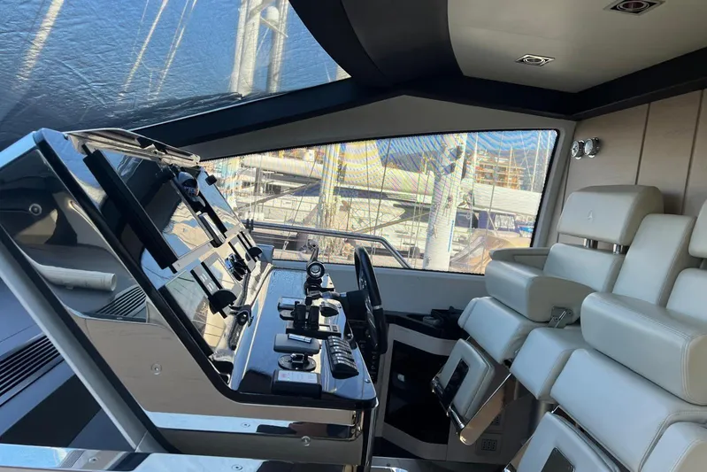  Yacht Photos Pics Interior cockpit of 2015 Azimut 80 yacht with modern controls and seating.