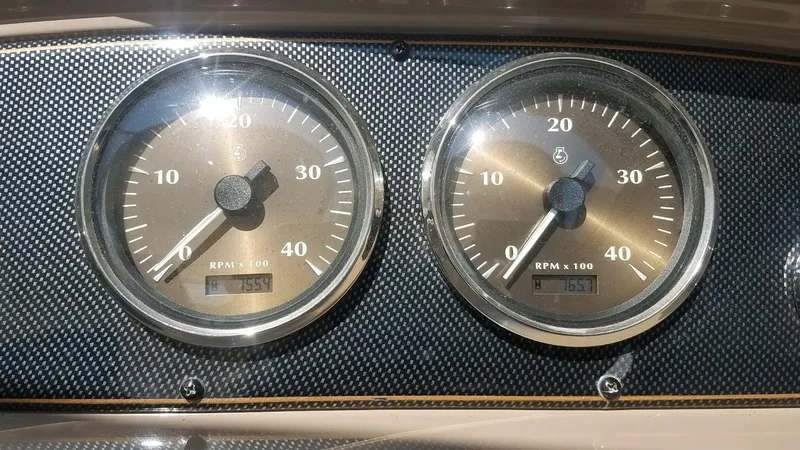 Instant Karma Yacht Photos Pics Close-up of Maxum 4200 SY 2002 boat tachometers displaying RPM readings.