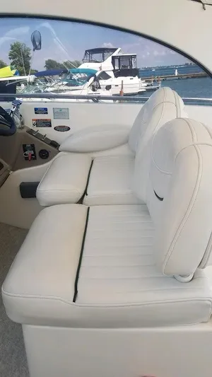 Instant Karma Yacht Photos Pics Interior of 2002 Maxum 4200 SY yacht with white leather seating.