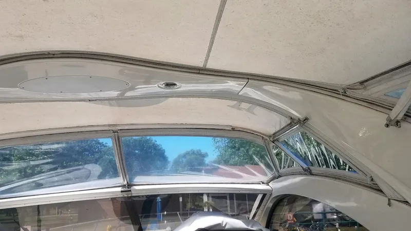 Instant Karma Yacht Photos Pics Interior view of 2002 Maxum 4200 SY boat with clear windows and sleek design.