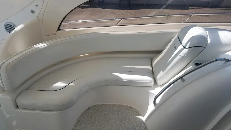 Instant Karma Yacht Photos Pics 2002 Maxum 4200 SY yacht interior with curved seating and elegant design.