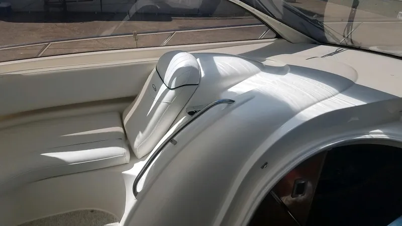 Instant Karma Yacht Photos Pics Interior of 2002 Maxum 4200 SY yacht, featuring sleek white seating and modern design.