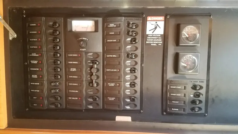 Instant Karma Yacht Photos Pics Electrical control panel of 2002 Maxum 4200 SY boat with switches and gauges.