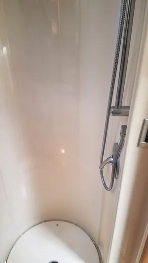 Instant Karma Yacht Photos Pics Shower area in 2002 Maxum 4200 SY yacht, featuring sleek design and modern fixtures.