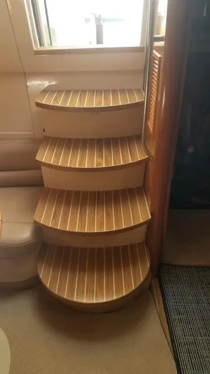 Instant Karma Yacht Photos Pics Wooden steps inside a 2002 Maxum 4200 SY yacht.