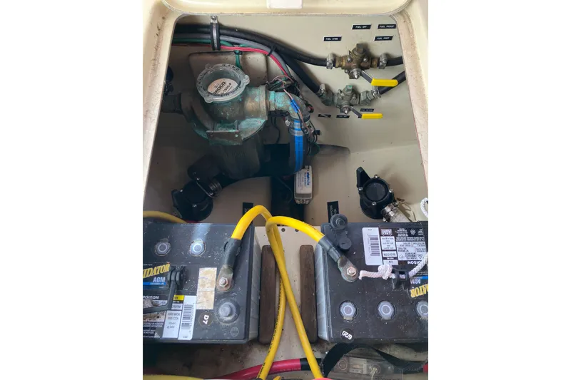 Virginia Yacht Photos Pics Engine compartment of a 2010 C.W. Hood WASQUE 26 with batteries and wiring.