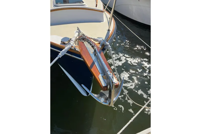 Virginia Yacht Photos Pics Bow of 2010 C.W. Hood WASQUE 26 with anchor over water.