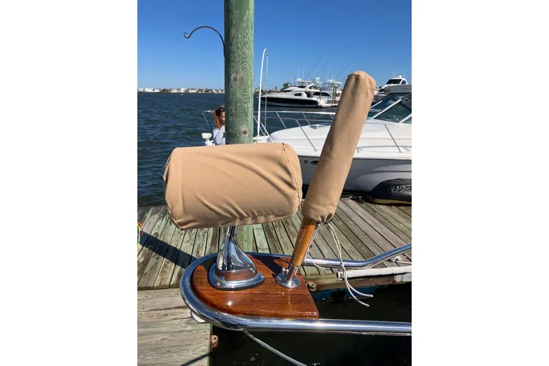 Virginia Yacht Photos Pics C.W. Hood WASQUE 26 boat, 2010 model, docked with covered equipment, sunny day.