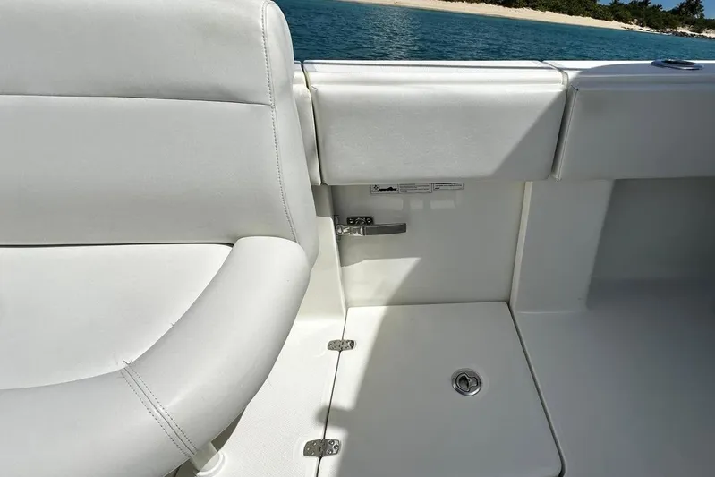  Yacht Photos Pics 2022 SeaVee 390Z boat interior with white seating and ocean view.