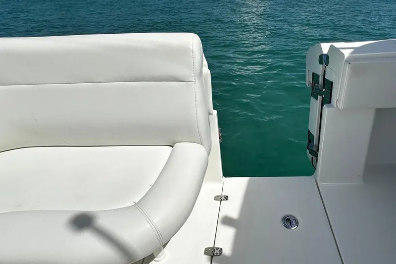  Yacht Photos Pics 2022 SeaVee 390Z boat with white seating, open deck, and ocean view.