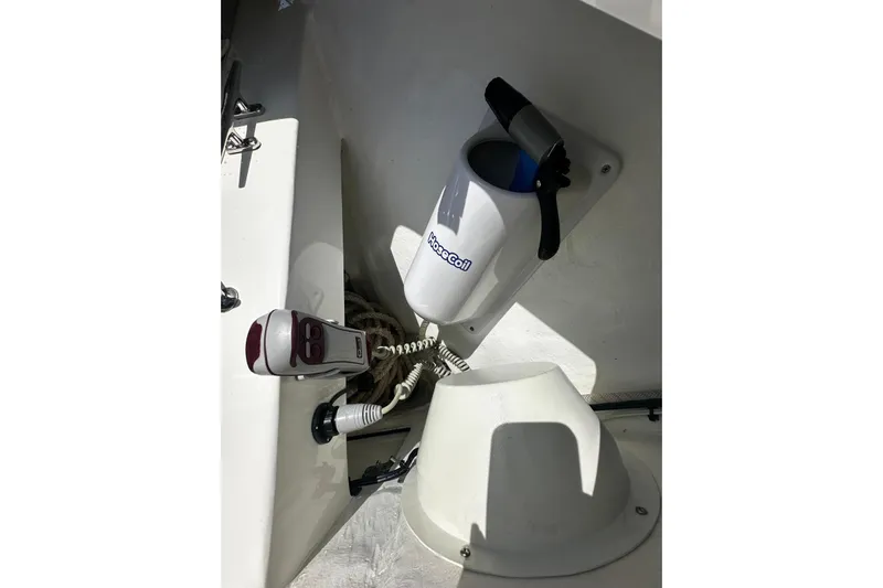  Yacht Photos Pics 2022 SeaVee 390Z boat interior with hose and equipment storage.