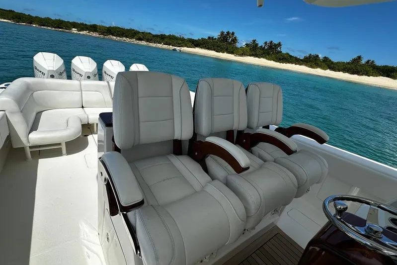  Yacht Photos Pics 2022 SeaVee 390Z boat interior with luxurious seating and ocean view.