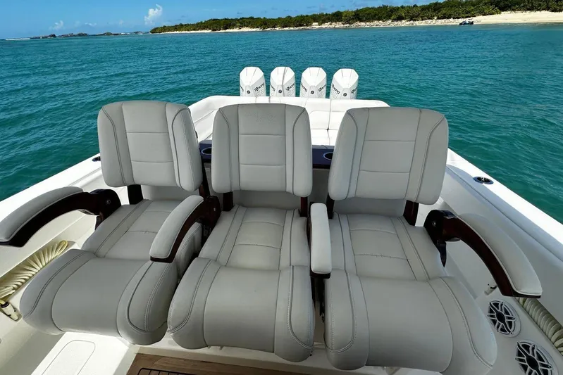  Yacht Photos Pics Luxury seating on 2022 SeaVee 390Z boat with ocean backdrop.
