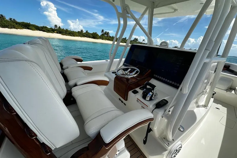  Yacht Photos Pics 2022 SeaVee 390Z boat interior with luxurious seating and advanced navigation system.
