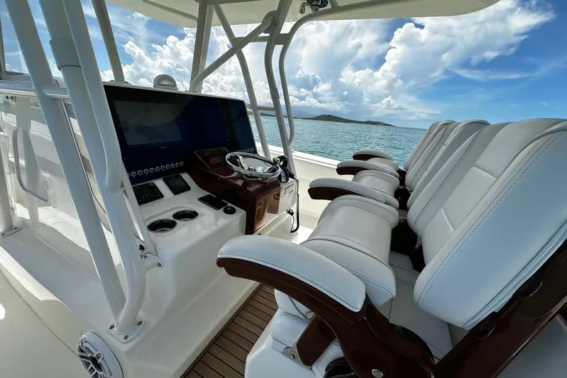  Yacht Photos Pics 2022 SeaVee 390Z boat interior with luxurious seating and modern helm controls.