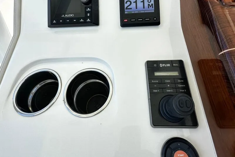  Yacht Photos Pics Control panel of 2022 SeaVee 390Z boat with FLIR system and cup holders.