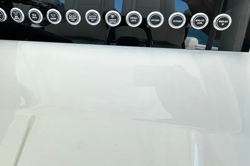  Yacht Photos Pics Control panel of a 2022 SeaVee 390Z boat with labeled switches.