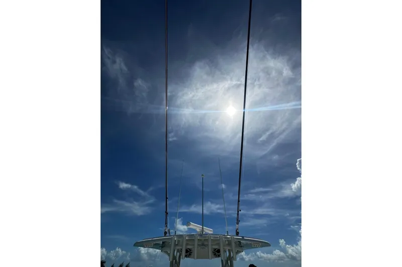  Yacht Photos Pics 2022 SeaVee 390Z boat under a bright sun and clear blue sky.