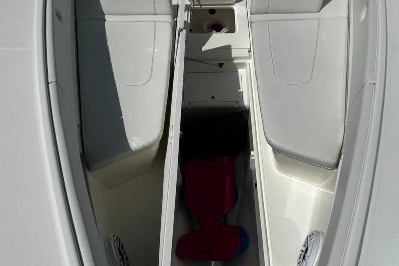  Yacht Photos Pics 2022 SeaVee 390Z boat interior with storage compartments and seating.