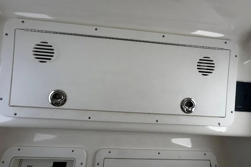  Yacht Photos Pics 2022 SeaVee 390Z boat interior panel with speakers and latches.