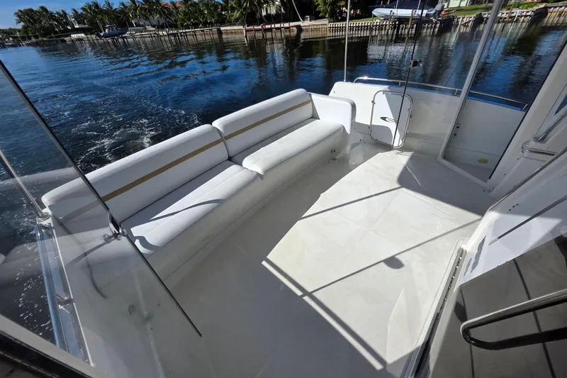 Aloha Spirit Yacht Photos Pics 2005 Carver 41 Cockpit Motor Yacht with spacious seating and scenic water view.