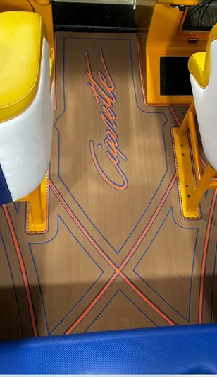 On Your Mark Yacht Photos Pics 2005 Cigarette 39 Top Gun boat interior with custom flooring and vibrant seating.