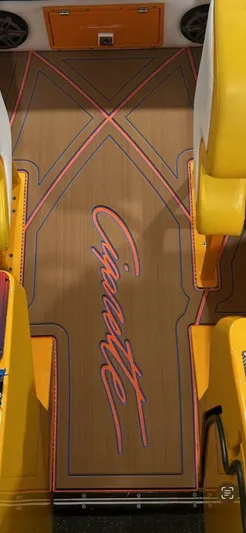 On Your Mark Yacht Photos Pics 2005 Cigarette 39 Top Gun boat interior with custom flooring and vibrant yellow seating.