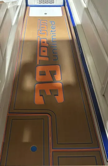 On Your Mark Yacht Photos Pics 2005 Cigarette 39 Top Gun boat interior with branded flooring design.