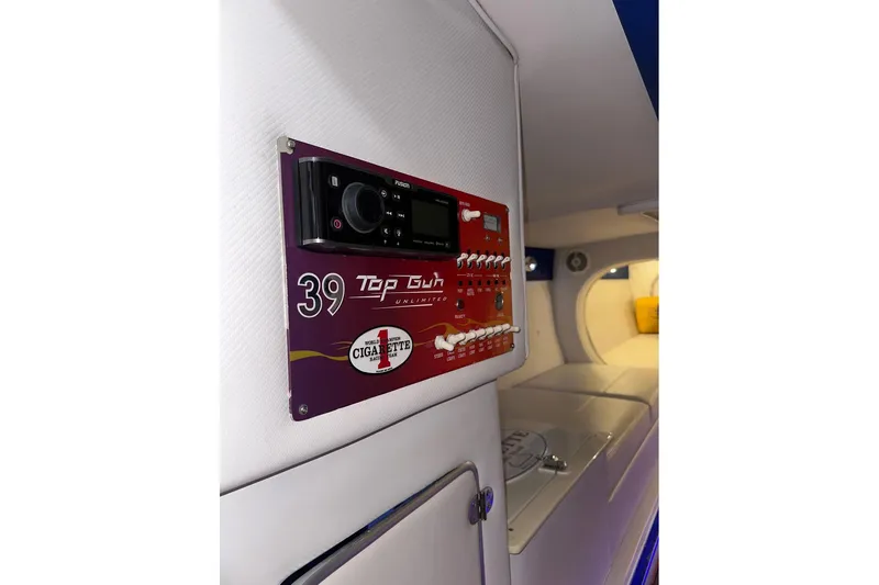 On Your Mark Yacht Photos Pics 2005 Cigarette 39 Top Gun Unlimited interior control panel with modern audio system.