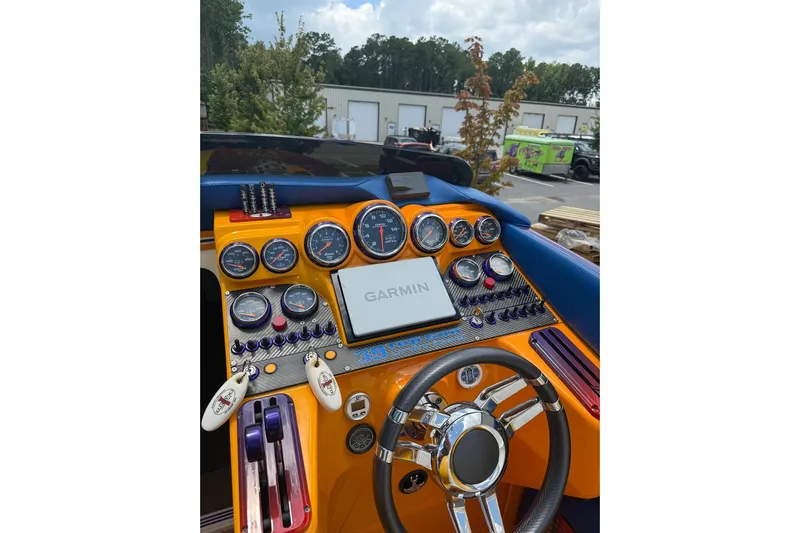 On Your Mark Yacht Photos Pics Dashboard of a 2005 Cigarette 39 Top Gun Unlimited boat with Garmin navigation system.