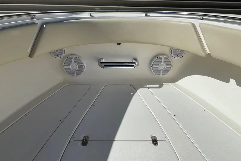  Yacht Photos Pics 2007 Fountain 34 Center Console boat interior with speakers and storage compartments.