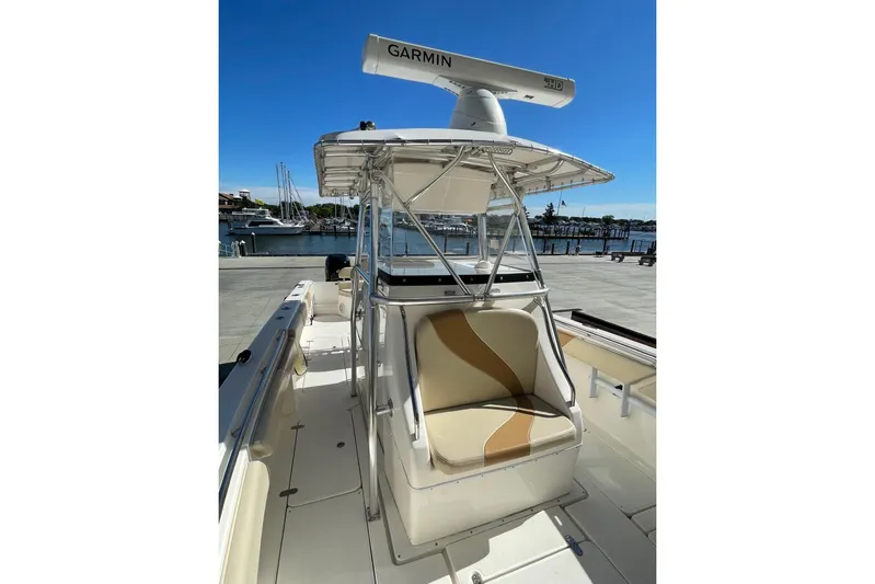  Yacht Photos Pics 2007 Fountain 34 Center Console boat with Garmin radar, docked at marina.