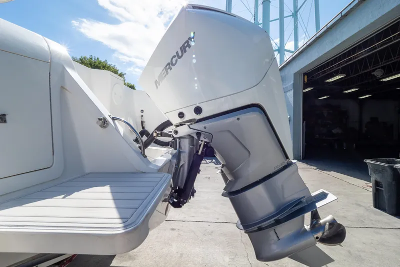  Yacht Photos Pics 2007 Intrepid 350 WA boat with Mercury outboard motor in a sunny marina setting.
