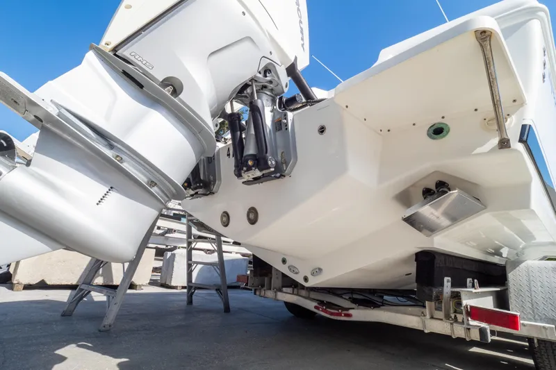  Yacht Photos Pics 2007 Intrepid 350 WA boat on trailer, showcasing outboard motor and hull details.