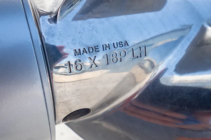  Yacht Photos Pics Close-up of a 2007 Intrepid 350 WA propeller, marked "Made in USA 16 X 18P LH".