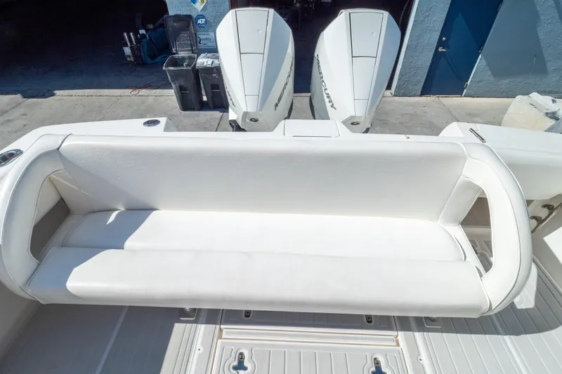  Yacht Photos Pics 2007 Intrepid 350 WA boat with white seating and dual Mercury outboard engines.