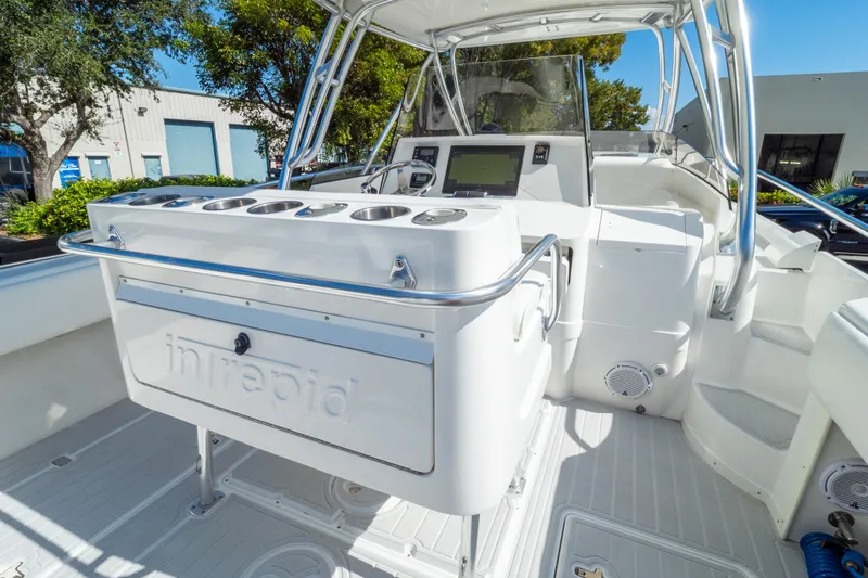  Yacht Photos Pics 2007 Intrepid 350 WA boat interior with helm and seating area.