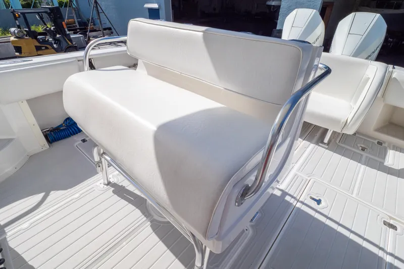  Yacht Photos Pics 2007 Intrepid 350 WA boat interior with white seating and dual outboard engines.