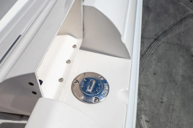  Yacht Photos Pics 2007 Intrepid 350 WA boat waste cap on white deck surface.