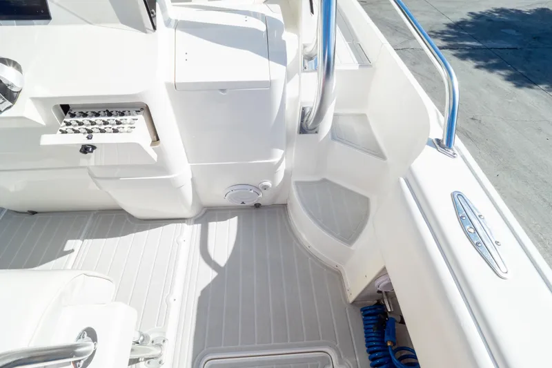  Yacht Photos Pics 2007 Intrepid 350 WA boat interior with white seating and stainless steel railings.