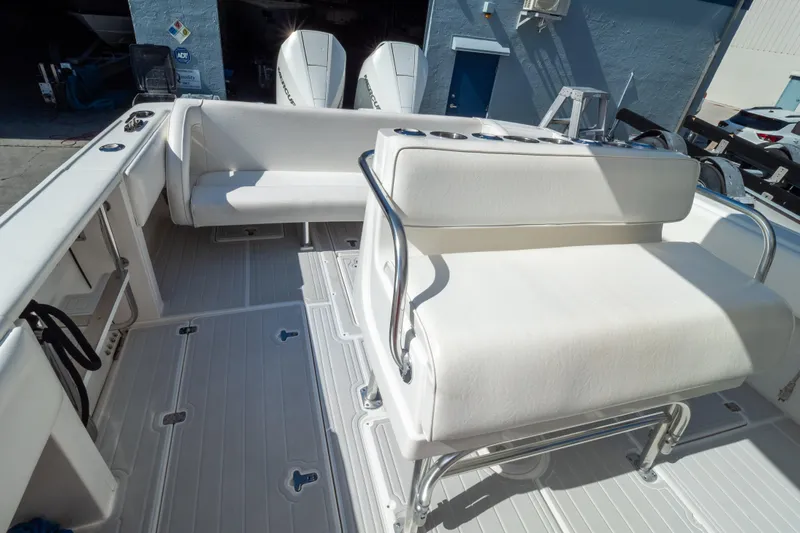  Yacht Photos Pics 2007 Intrepid 350 WA boat interior with white seating and twin engines.