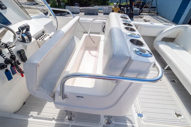  Yacht Photos Pics 2007 Intrepid 350 WA boat interior with seating and cup holders.