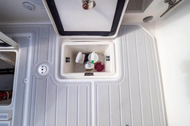  Yacht Photos Pics 2007 Intrepid 350 WA boat deck with open storage compartment.