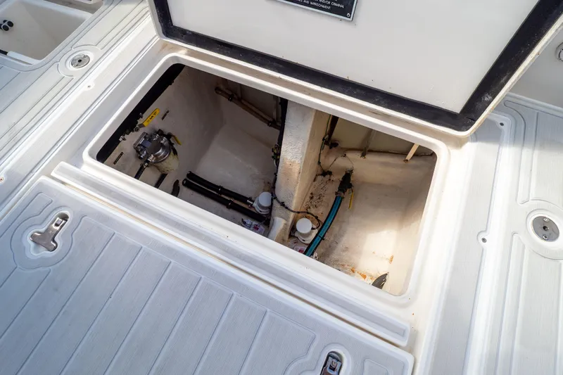  Yacht Photos Pics Open hatch of a 2007 Intrepid 350 WA boat showing internal compartment.