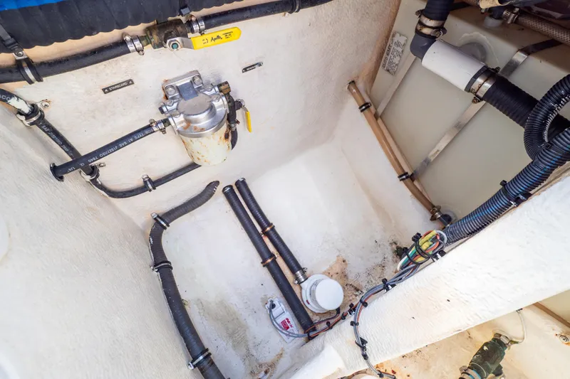  Yacht Photos Pics Engine compartment of a 2007 Intrepid 350 WA boat, showing hoses and wiring.