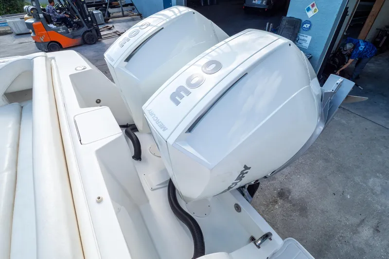  Yacht Photos Pics 2007 Intrepid 350 WA boat with twin Mercury outboard engines in a marina setting.