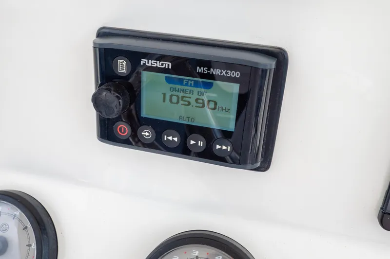  Yacht Photos Pics Fusion MS-NRX300 radio display on 2007 Intrepid 350 WA boat dashboard.