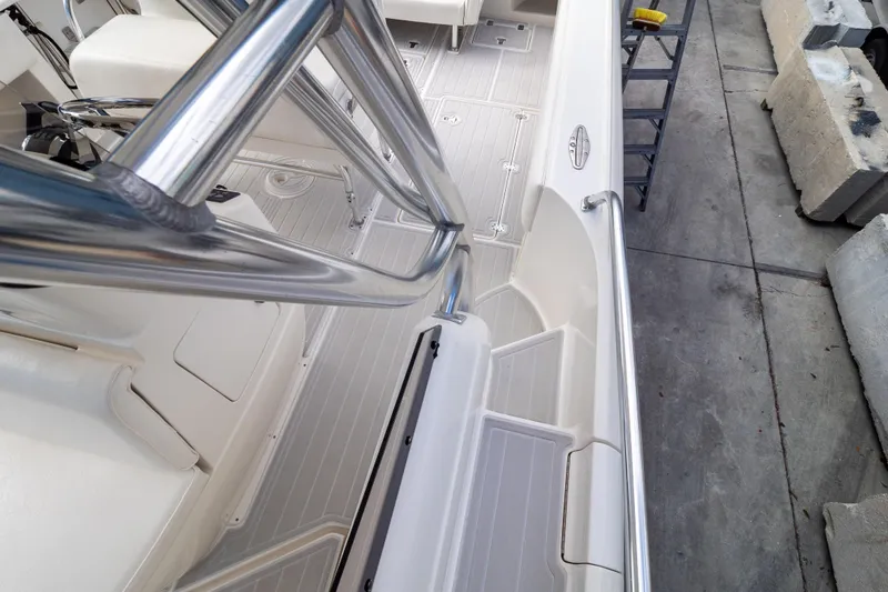  Yacht Photos Pics 2007 Intrepid 350 WA boat deck with stainless steel railings and seating area.