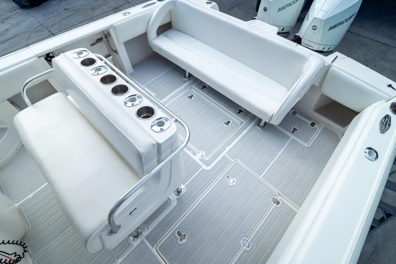  Yacht Photos Pics 2007 Intrepid 350 WA boat interior with white seating and multiple cup holders.